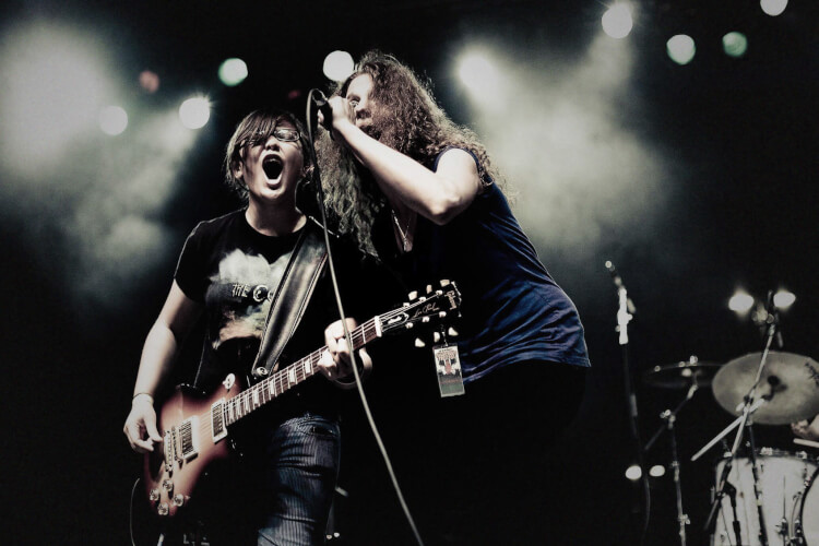 Students performing a rock concert
